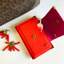 Load image into Gallery viewer, red pink a6 planner, personal planner, planner agenda, gale and co trinidad, made in trinidad and tobago, planner babe, luxury planners, planner accessories, faux leather planner, vegan leather brand, vegan leather planner, caribbean designer