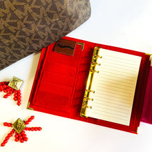 Load image into Gallery viewer, red pink a6 planner, personal planner, planner agenda, gale and co trinidad, made in trinidad and tobago, planner babe, luxury planners, planner accessories, faux leather planner, vegan leather brand, vegan leather planner, caribbean designer