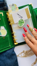 Carregar imagem no visualizador da galeria, budget binder, cash organiser, money purse, cash envelope wallet, cash envelope binder, money binder, green wallet, gale and co trinidad, made in trinidad and tobago, caribbean designer, green a6 planner, luxury planners, luxury stationery, stationery supplies, vegan leather brand, faux leather wallet.